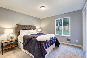 Lovely master bedroom with soft grey walls