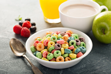 Fruit colorful sweet cereals with juice and cocoa
