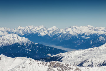 Sunny view of Austrian Alps from viewpoint of ski resort Zillertal Hintertuxer Glacier, Tirol, Austria.