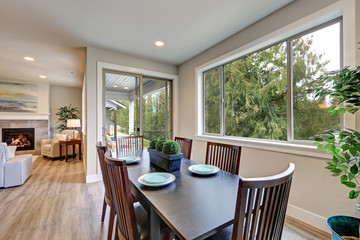 Neutral dining room interior fitted with black dining table