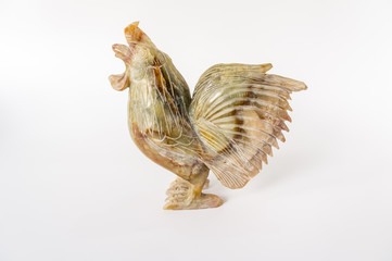 chicken sculpture, decorate,  Decorative sculpture rooster on white background . chicken sculpture isolate. Rock sculpture of cock .