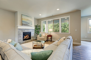 Family room interior features grey linen sectional