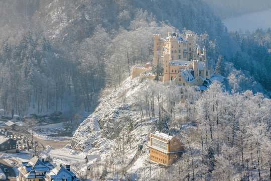 Snowy Bavarian Alps and Hohenschwangau castle from viewpoint of Neuschwanstein castle, Bavaria, Germany.