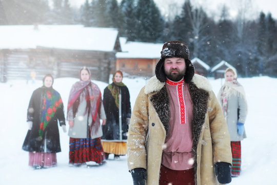 Traditional winter costume of peasant medieval age in russia