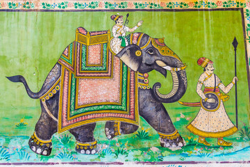 Fresco of an elephant and two warriors