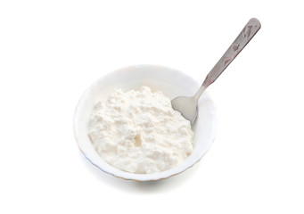 soft cottage cheese in a white plate on a white background