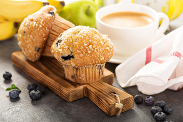 Blueberry and banana muffins with coffee for breakfast