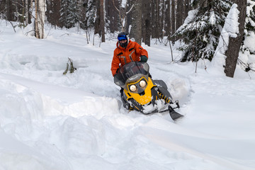 Athlete on a snowmobile