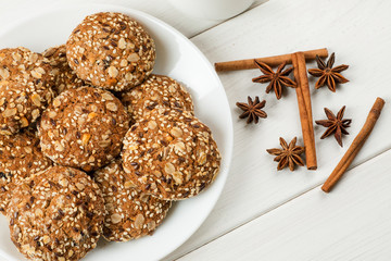 Top view of oatmeal cookies on a white wooden table