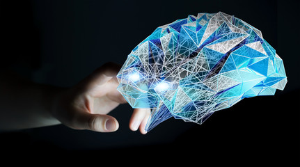 Businesswoman touching digital x-ray human brain with her finger