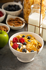 Cereal bar or buffet wih cornflakes, fruit and nuts