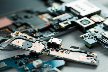 Closeup shot of disassembled cell phone parts