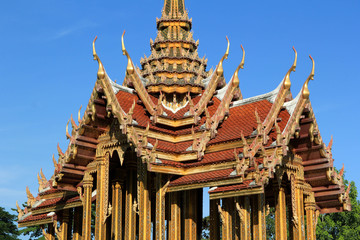 Thai art golden pavilion on the lake