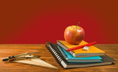 Image of stationery and red cup closeup