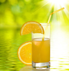 Isolated image of orange juice on a white background on water background
