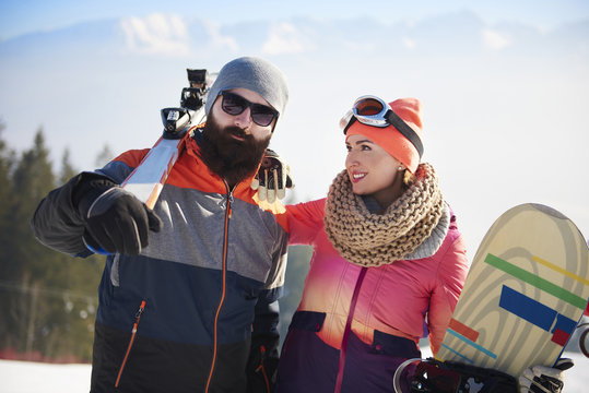 Young couple on the ski trip