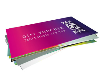 set of different designs for gift vouchers in a pile