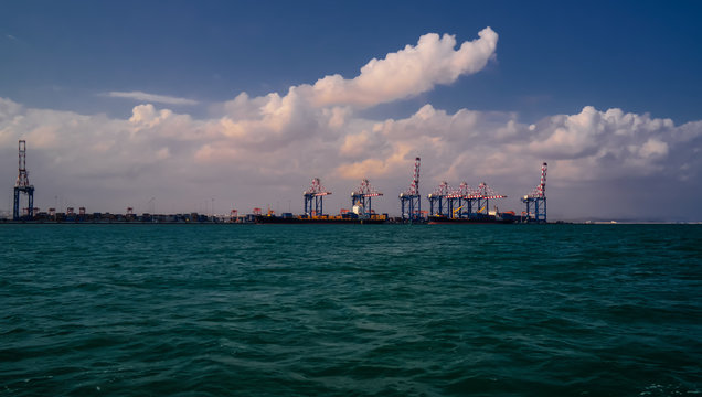 Panorama of Djibouti port with ships and cargo crane