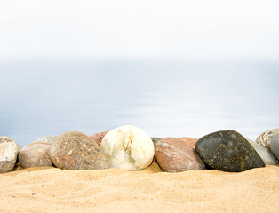 Image of many stones on a water background
