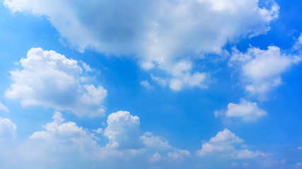 Obraz na płótnie Canvas White clouds and blue sky background