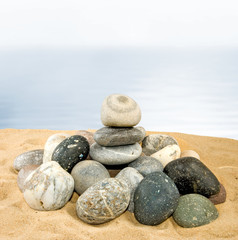 Fototapeta na wymiar Image of many stones on a water background