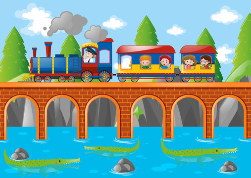 Children riding on train over the bridge