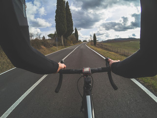 Having fun on a bicycle in Tuscany. Cyclist personal perspective.