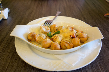dumplings with cheese sauce