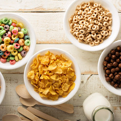 Variety of cold cereals in white bowls