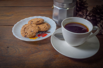 coffee cookie on table wood in the morning 