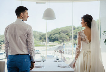 Brides standing  at restaurant