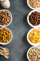 Variety of cold cereals in white bowls