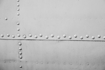Aircraft metal plating texture with rivets