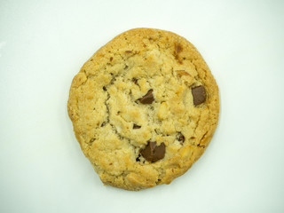 Chocolate chip cookies on white background, top view