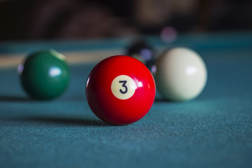 Billiard balls on a pool table, Three ball.