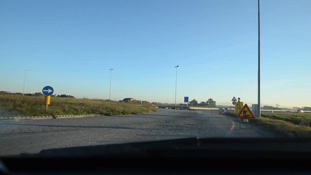 Road surface in poor condition in a roundabout