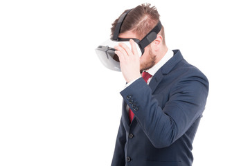 Young businessman trying vr goggles