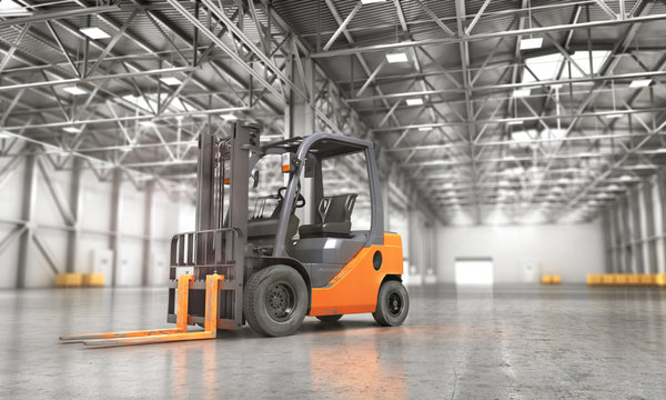 Concept of warehouse. The forklift in the empty big warehouse on