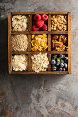 Breakfast foods in a wooden box overhead shot