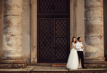 The brides standing on the stairs