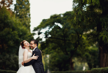 Couple in love embracing  in the park