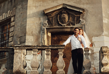 Couple in love embracing on the balcony