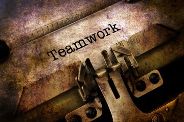 Teamwork text on vintage typewriter