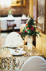 Wedding flower arrangements on the table in restaurant