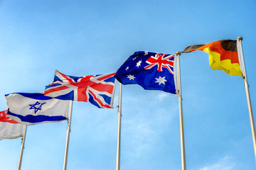 national flags flying in wind