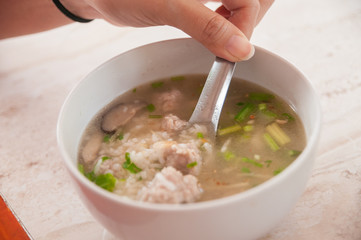 Yummy on morning with a delicious bowl of rice porridge