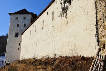 Wall of old castle in Banska Stianivca with Himmerleich square bastion tower - obrazy, fototapety, plakaty