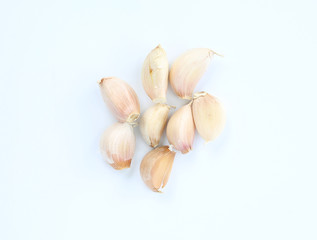 garlic cloves on white background