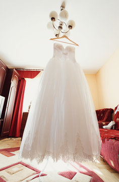Wedding dress of the bride in the room