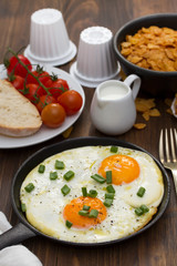 breakfast on brown wooden background